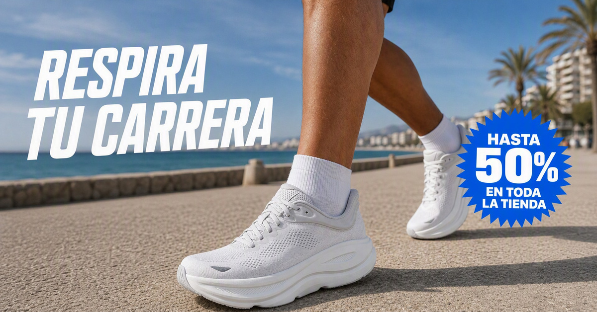 Corredor con zapatillas blancas sin logotipos en un paseo marítimo
